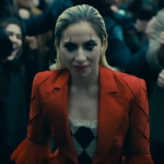 Lady Gaga’s Harley Quinn Steps Out in a Comic-Inspired Outfit in New Look at Joker: Folie Á Deux